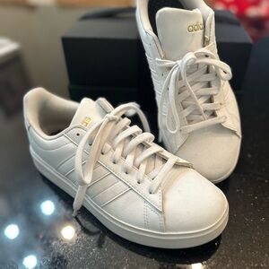 adidas Women’s White Sneakers with Gold Logo Accent